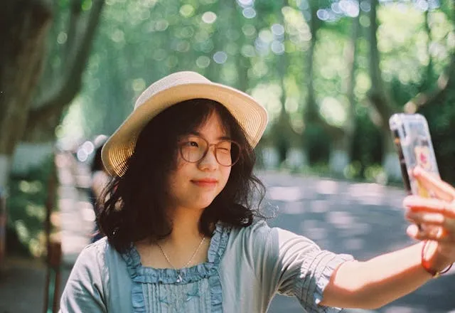 Photo by zheng liang: https://www.pexels.com/photo/teenager-taking-selfie-25210057/